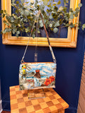 Crossbody bag in vintage Hawaiian print with beaded parrot charm