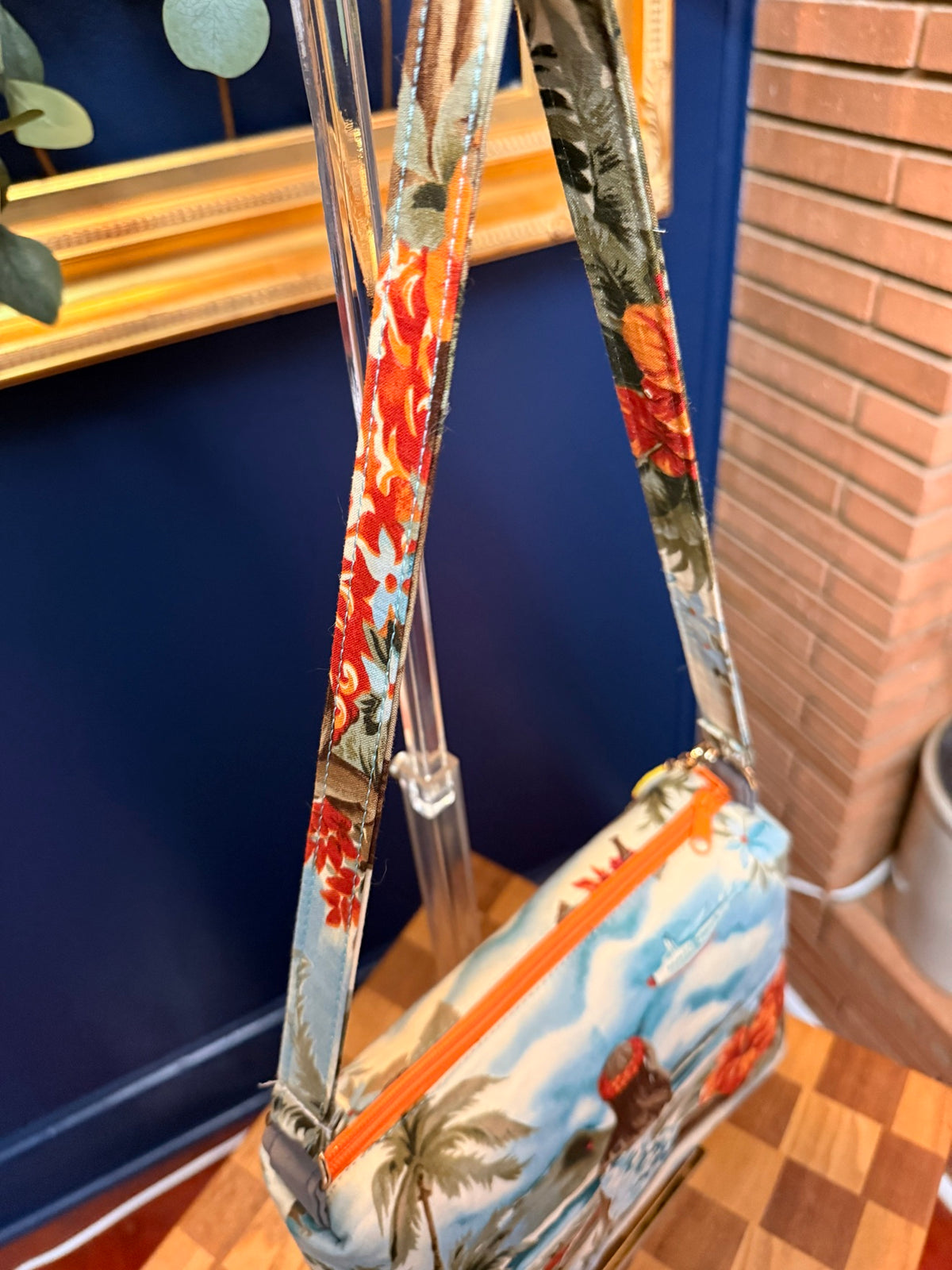 Close-up of matching fabric strap on Hawaiian crossbody