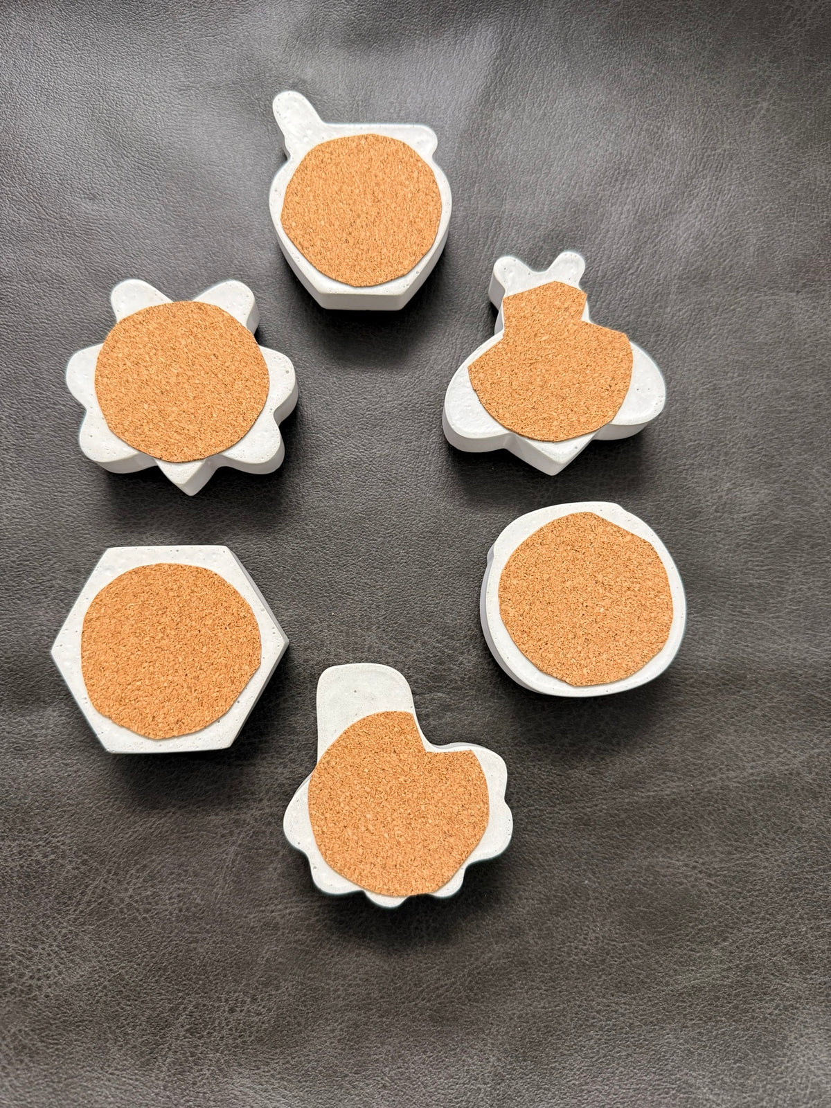 Cork bottoms of the bee and honey fabric weights