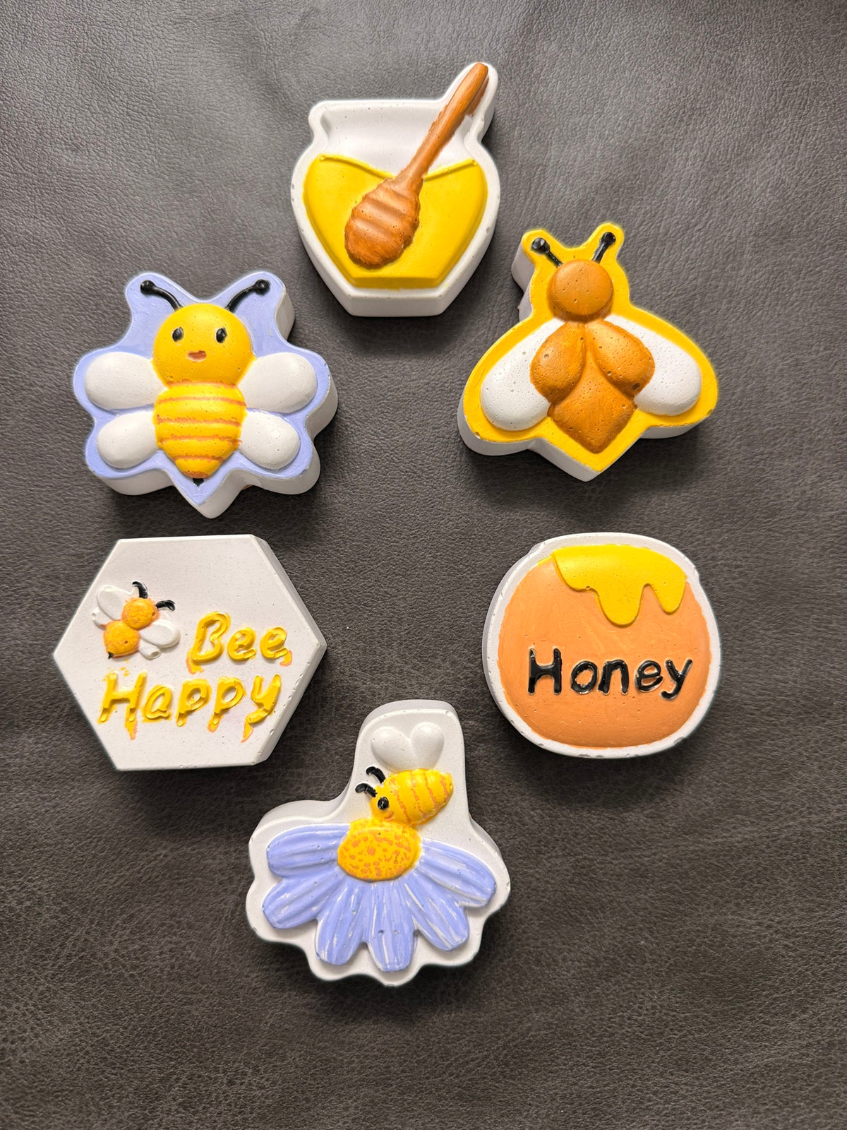 Hand-painted bee and honey designs: honey pot, smiling bee, honey dipper and more