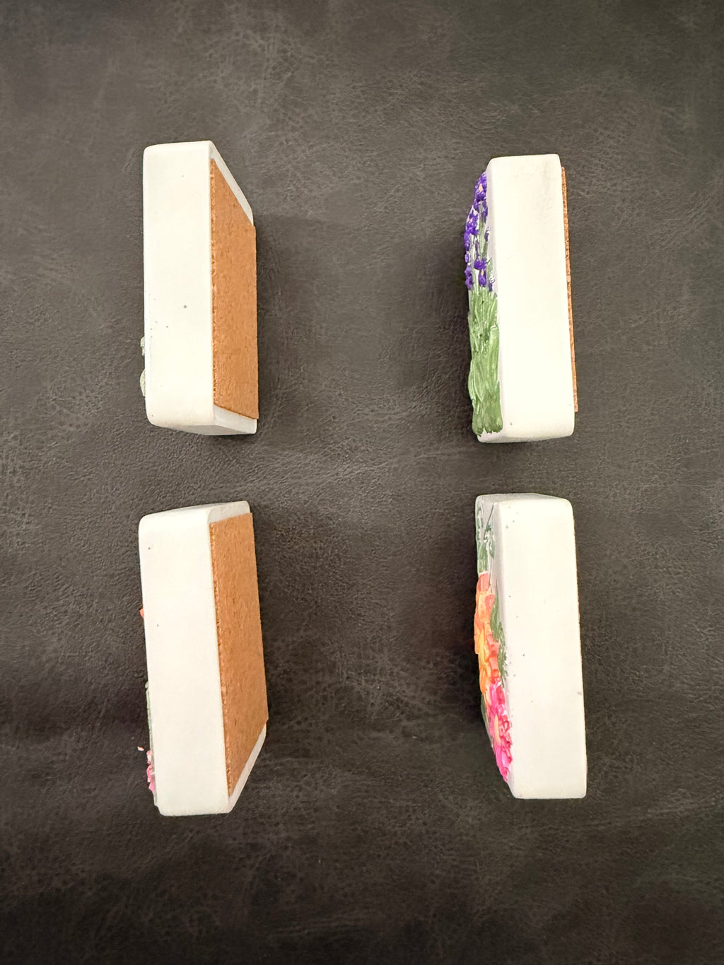 Set of 4 hand-painted fabric weights, side view showing cork bottoms