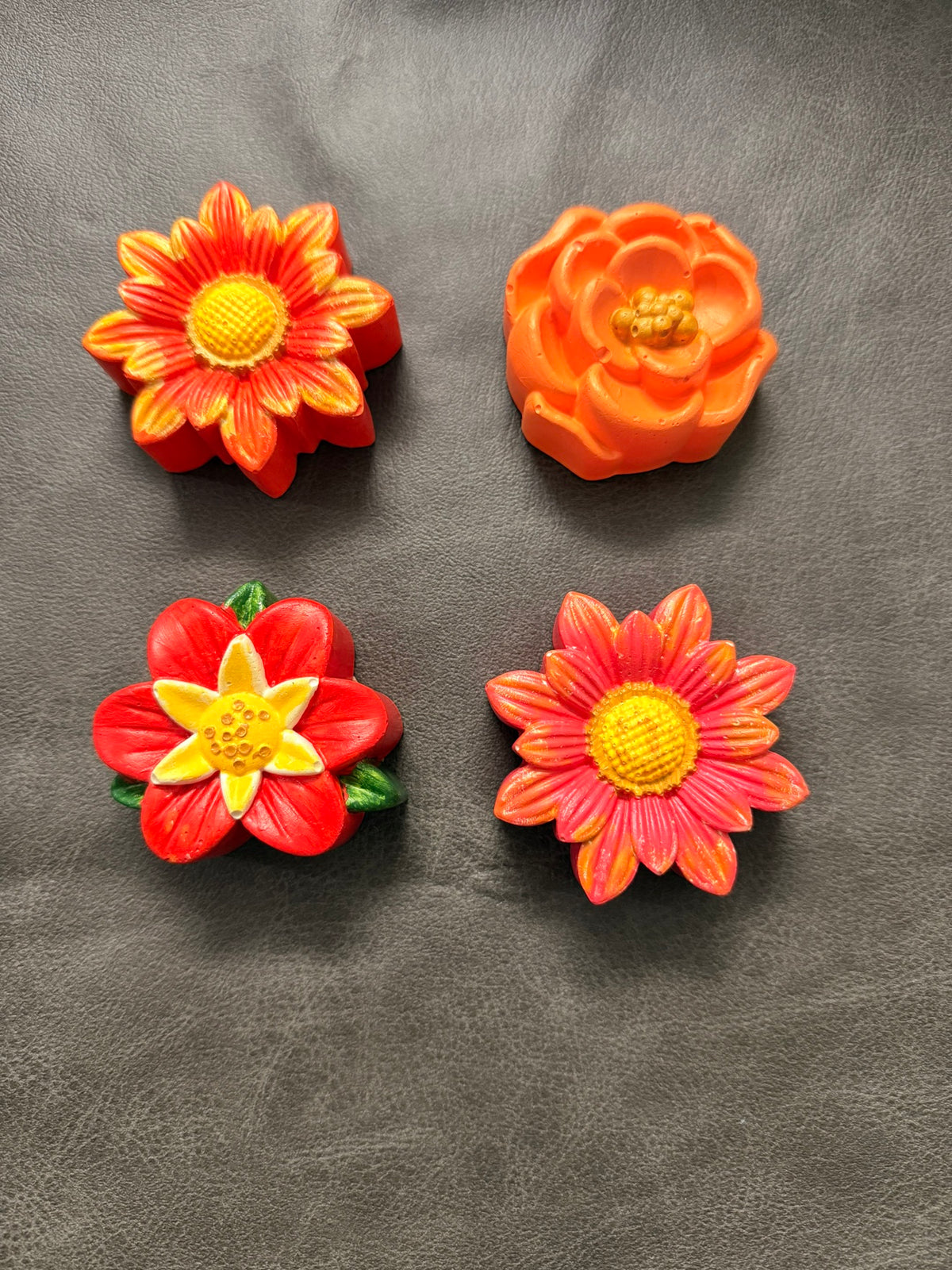 Hand-painted warm floral tops: red-orange daisy, orange rose, red blossom and pink daisy