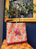 Vintage rose tote with embroidered little monster, front view