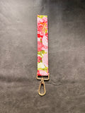 Keychain wristlet in pink watercolor rose fabric with gold hardware