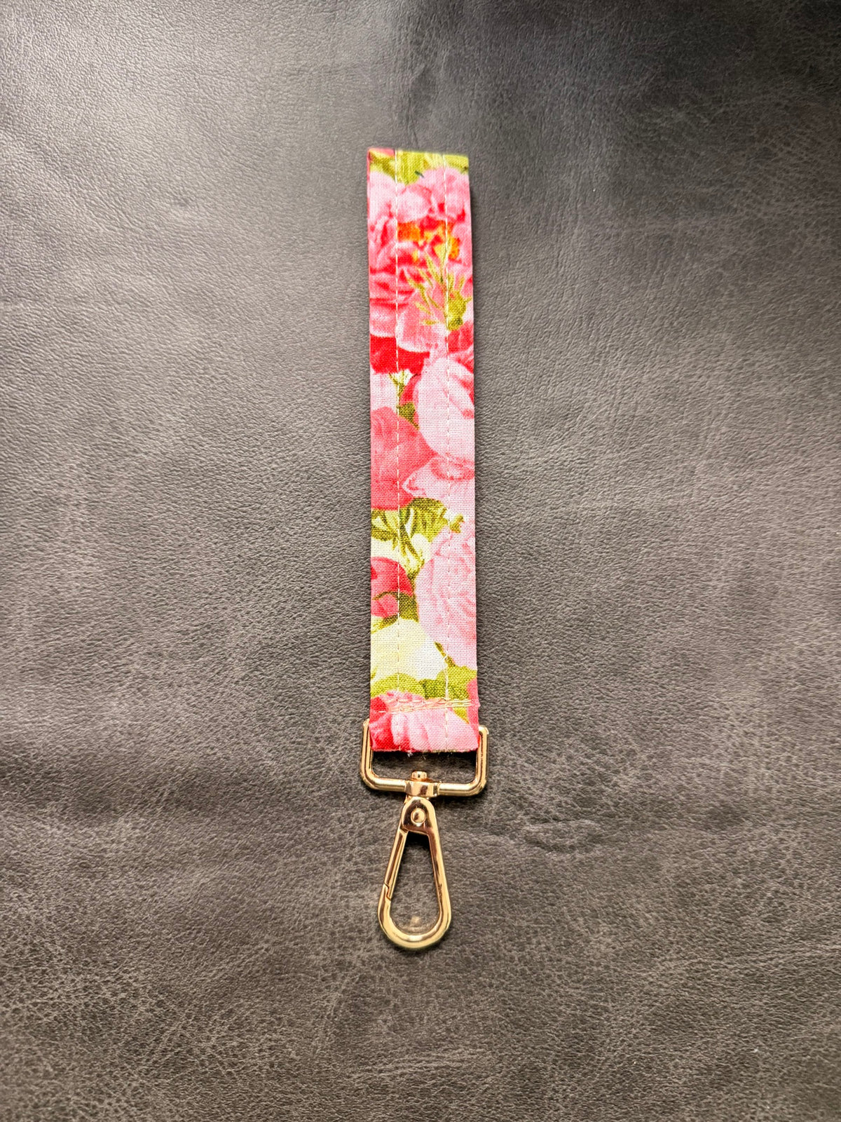 Keychain wristlet in pink watercolor rose fabric with gold hardware
